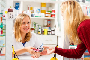 caregiver buying medicine at the drugstore